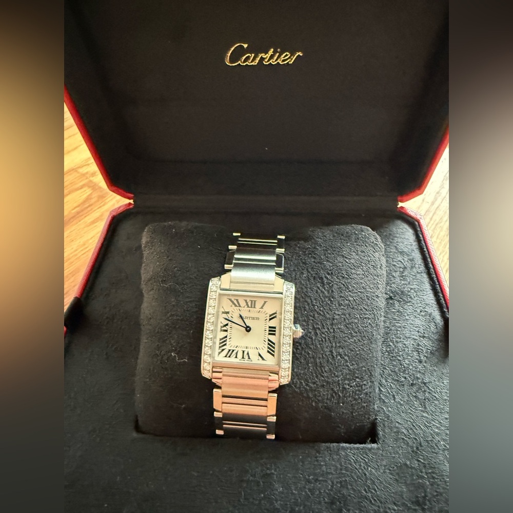 Cartier watch Tank, medium size, stainless steel with diamonds.